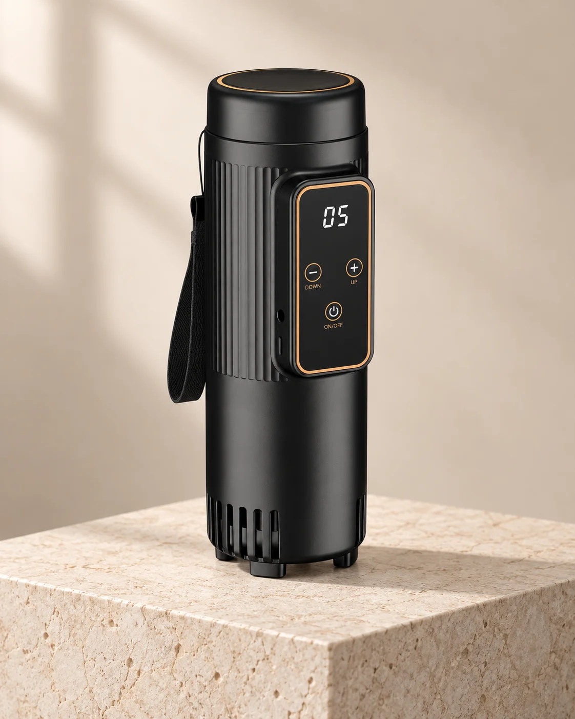 Black cylindrical VialCool cooler with ribbed body and gold-trimmed digital controls on a stone plinth